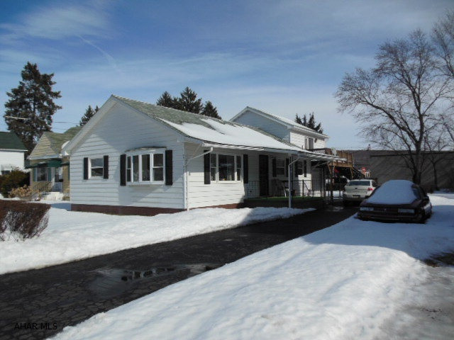 Meticulously kept ranch home with a 1 car garage attached. An additional bedroom was built over the garage which is very large with a closet and sliding doors to use as a private entrance with a deck.  This is large enough to install another bath. Level lot, aluminum sided, 200 amp electric, some fencing, very close to the mall, a number of shops, and eateries. Priced to sell. Flood plain but never has been a problem. No basement, but crawl space.  *Not for rent...