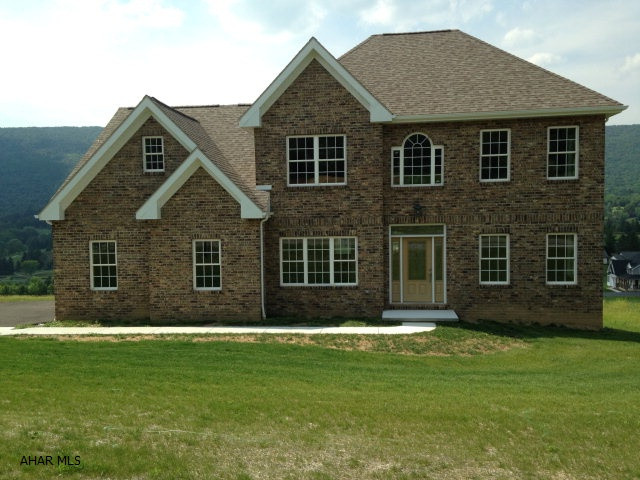 New construction! This bright & open 2 story home offers first floor bedroom or office, kitchen with breakfast nook, family room with gas fireplace, second floor master suite, 2 car garage. Quality construction with poured basement walls. Walk out basement can be finished for large family room. Amazing views of the valley!