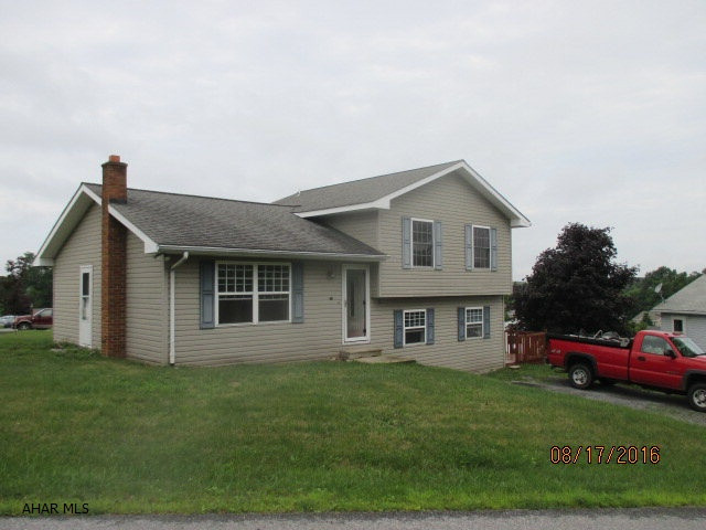 3 bedroom 1.5 bath home with finished lower family room.  Additional flu off of main living room for alternate heat source.