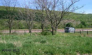 65X110 VACANT LOT WITH DEED RESTRICTIONS.