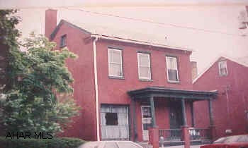 Older 2 story investment property Sold as is. Needs work. Four bedrooms. Two baths.  Could be changed to duplex