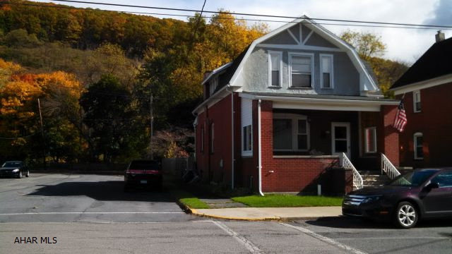 Well maintained, brick, 2-story home on a corner lot.  New baseboard boiler system (6-7 yrs. old).  Low heating bills.  New roof in 2010.  New copper plumbing.  Newer windows.  Hardwood floors under carpeting and plywood.  Flood ins. quote on file.