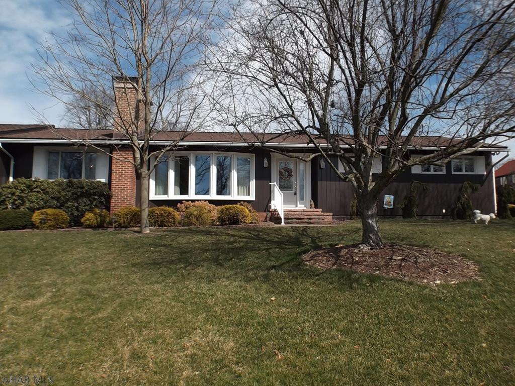 Come see this immaculate and spacious ranch home located on a quiet, limited access street in Sylvan Hills.   Sunken living room has a double fireplace opening into the dining room.  Cozy sunroom at rear of the house.  Three bedrooms, two and one-half bathrooms.  Beautifully landscaped 1/2 acre lot with many perennials and flowering shrubs.  Central A/C and central vac system.  Basement has a full kitchen with appliances and lots of storage cabinets and shelving.  Sump pump in utility room with battery backup.  Floor drains have been sealed.  Water softener system is owned.  House is equipped with humidity control system, air purifier and security system.  Electric dog fence around perimeter; dog collars do not stay. SELLER IS PROVIDING AN AHS HOME WARRANTY.   PLEASE REMOVE SHOES.