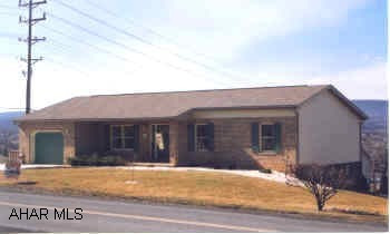 Very attractive, well maintained 3 BR, 2 bath, one story, beautifully decorated, 2 sky lights, dining room deck, patio,attached garage, all with a great view.                          Very attractive, well maintained 3 BR, 2 bath, one story rancher, beautifully decorated, dining room, french doors,  2 sky lights, deck, patio, attached garage, all with a great view.  Brick front, concrete driveway, glass sliding doors in basement could be finished into large family room.  In Logan Twsp.