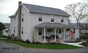 Center hall two-story offers open entry and nice size rooms.  Many last four year improvements include furnace, central air, plumbing, interior doors and trim, flooring, paint, solid oak kitchen, most windows on 1st floor, deck and deck roof. This home is delightful to see!  Open foyer in this center hall two story with spacious rooms throughout!  All original flooring upstairs, pergo in dining room, berber in livingroom.  Solid oak kitchen has built in microwave and stove and refrigerator are negotiable.  1st floor full bath and laundry area, huge covered deck, above ground pool.  Master bedroom has a full bath and walk in closet.  Two other bedrooms have double closets. Square footage is estimated.