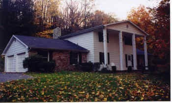 Beautiful, peaceful, private setting on 36 acres, 2 ponds, mountain stream, bridge. Two story 3BR, 2.5 bath Colonial with sunken LR, breakfast nook, lg. family room with bar, beautiful stone fireplace, den, 1st laundry, central vac, security system. Beautiful, peaceful, private setting on 36 acres, 2 ponds, mountain stream, bridge,  This 2 story, 3 br, 2.5 bath Colonial has sunken LR, Breakfast nook, lg. family room with bar & stone fireplace,den 1st fl. laundry, central vac, security system, paved driveway, all nestled in the woods waiting for you.