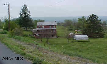 Beautiful country setting RT 36 S from Roaring Spring; turn R into Loysburg past Lions Club continue 1.3 miles on Main Rd. turn L onto Bull Run, home on R. J-547 Beautiful country setting RT 36S from Roaring Spring; turn R into Loysburg past Lions Club continue 1.3 miles on Main Rd. turn L onto Bull Run, home on R.  J-547
