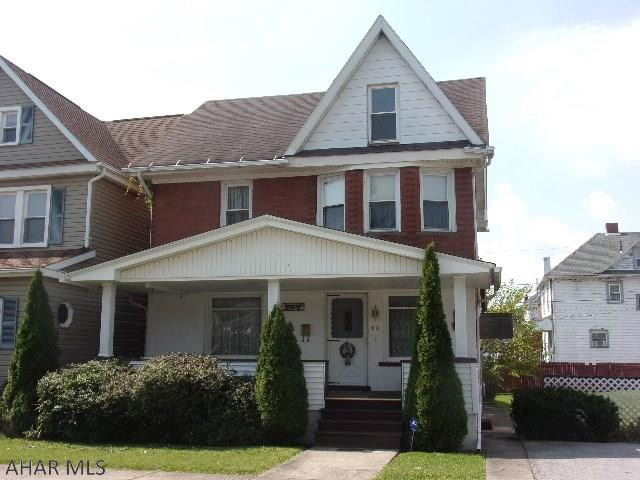 This 2.5 story brick home is roomy enough for your family with a great finished 3rd floor as a 4th bedroom.  Large living room, formal dining room and all natural oak trim and doors throughout.  An extra 30' x 110' lot with off-street parking is an added bonus for you!  Make this one your own!   To settle estate.
