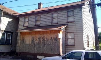 PRICED TO SELL! NEEDS TLC BUT GREAT POTENTIAL! NEWER FURNACE, PREVIOUSLY DUPLEXED
