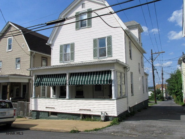 3 Bedroom, 1 bath, 2 story in move in condition with newer oak kitchen, spacious rooms, finished attic with walk in closet for 4th bedroom. Thermo pain windows, pocket doors to living room. 1/2 Bath in basement. A must see for the price.