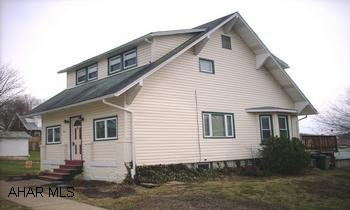 2 STORY VINYL SIDED HOME ON 100X120 LOT W/DET 1 1/2 CAR GARAGE PRETTY 3 BEDROOM WITH OAK KITCHEN,  DR W/BOW WINDOW, NEWER FLOOR COVERING, 2 YEAR OLD FURNACE, COVERED DECK, PORCH W/DOUBLE DECK TO ABOVE GROUND POOL.  100/120 LOT, 1 1/2 CAR GARAGE