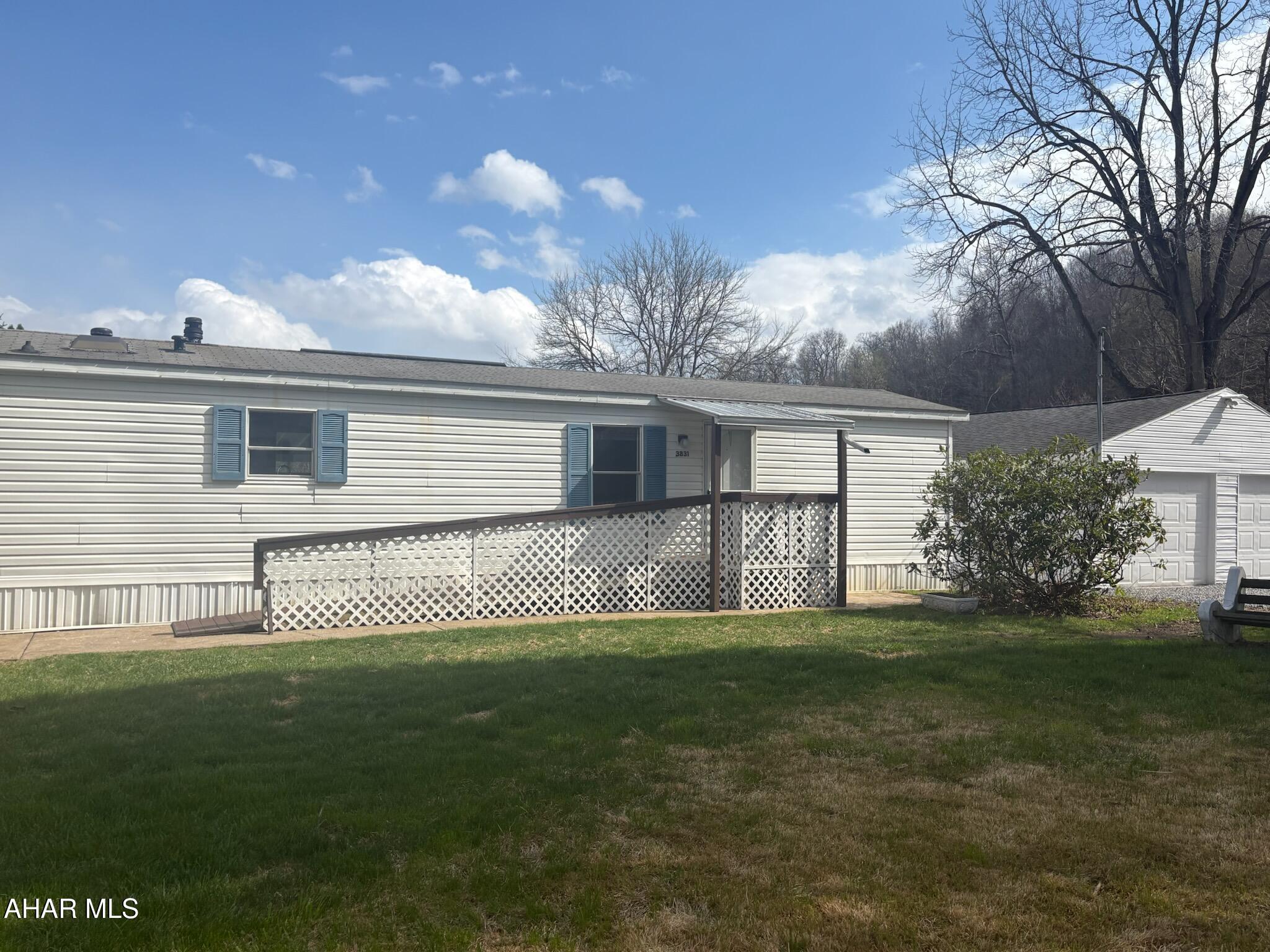 Welcome to this well maintained one-level home in the peaceful setting off Old Mill Run Rd. just minutes from all the city of Altoona has to offer! Enjoy a separate bathroom with each newly carpeted bedroom! Fresh paint throughout, new carpet in the living room, new stove, refrigerator, washer and dryer, and a new metal roof on the back patio are all part of this affordable, easy living home that boasts a huge 2 car garage with workshop, all sitting on a flat .30 acre yard! Title IS Retired!! Check out today!