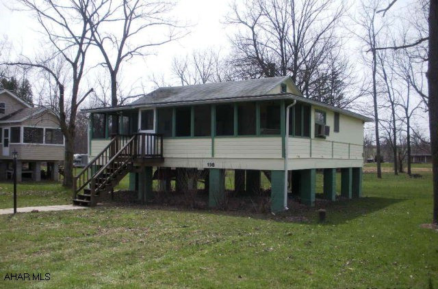 SUNSHINE BEACH COLONY; Cute SEASONAL cottage along Dunnings Creek.  Screened-in front porch w/swing.  Raised up to protect from flooding.  Updated circuit breaker & original wood inside. $100 yearly camp dues.  Listed in time for you to put your Kayak in the creek and enjoy! Camp restrictions. Don't miss out on any of this summer's fun in your own family camp.