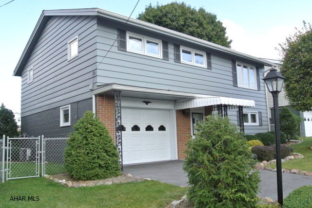 If you have been looking for a Really Nice home in a Very nice neighborhood.....I found it for you here on South 10th st....A great location with many beautiful modern homes.   And....this Meticulous 3+ bedroom, 1 1/2 bath home has many modern amenities, its well built, cared for, and move in ready!   This home features, central a/c, quality new windows, new paint, modern Kitchen, deep closets, all your appliances, and tremendous lower family room that walks out to your semi private fenced rear yard!  This home just offers so much...from beautiful landscaping to the large windows allowing through the natural sunlight.   It is priced to sell!!!!
