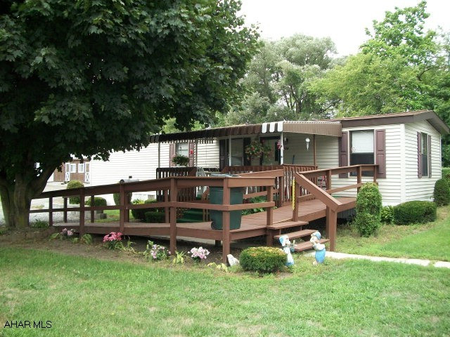 Great property - live in mobile home and collect rent on two lots also on deed.  Mobile home has large bedroom addition in rear.  Great convenient location to Walmart and I-99.  Mobile home is currently rented for $550 per month   Yearly Expenses:$236Ins./Taxes$665/Heat $1055/ Electric $1105/ Garbage$300/Sewer$600.  Each mobile home lot is rented for $170 each Yearly Expenses: Sewer $600each