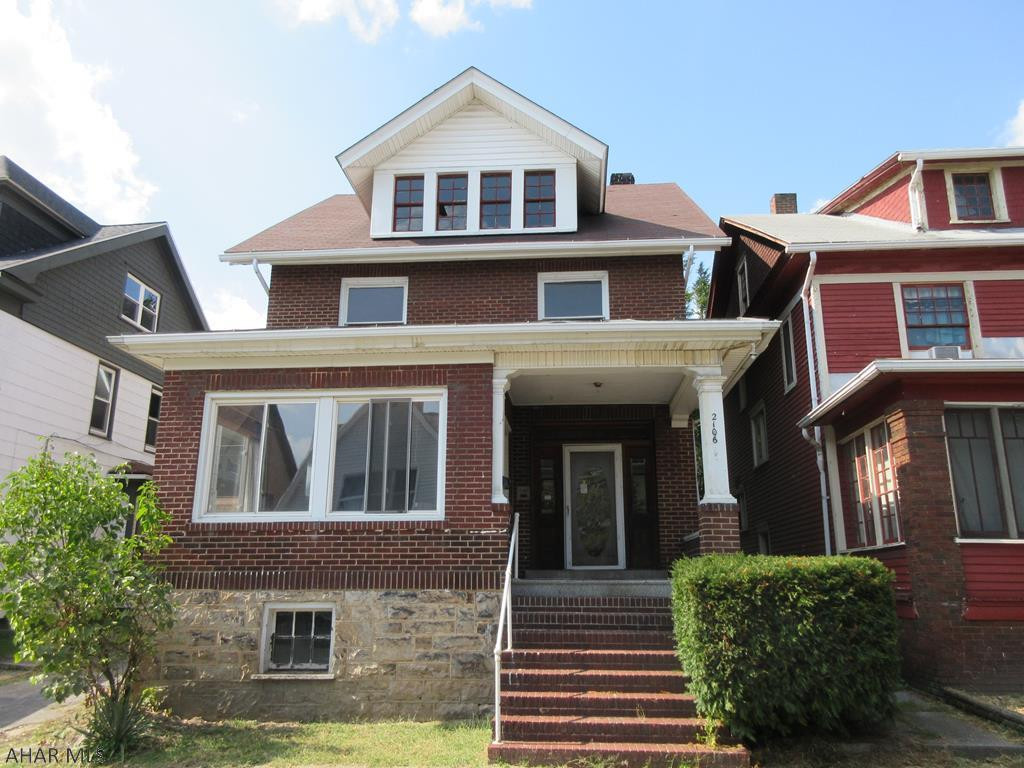 Altoona brick 2 story needs work, but loads of charm and possibilities throughout. Large formal living with fireplace, dining room with bay window, natural wood trim throughout, beautiful leaded glass window in stairway. Nice yard and 1 car detached garage. AS-IS sale. Seller will make no repairs.