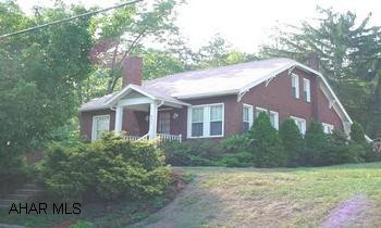 Classy 1.5 story brick with original oak trim and hardwood floors.  Great location!  Large private backyard.  Enclosed carport.  Second floor could be 2 addtional bedrooms.  Good mechanics - newer furnace and central air. Super 1-1/2 story home on large 80x120 lot.  Nice private back porch and yard.  Enclosed carport.  Second floor could be 2 additional bedrooms.  Modern kitchen with appliances.