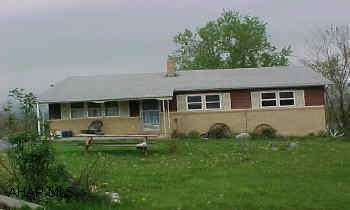 Great starter home/investment home on .78 acre lot.  3 BR, 1.5 BA, full basement easily finished.Directions:  Past DeGol's toward West Loop.  Go approximately .8 miles.  Turn right on Mountain View Drive.
