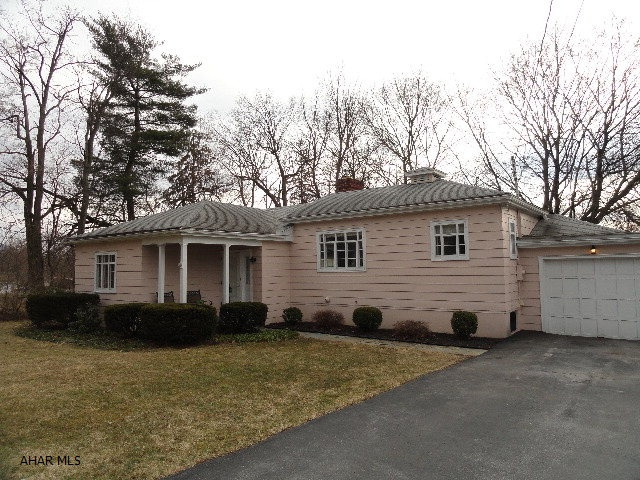 Charming 1 story on Sylvan Drive, Hollidaysburg. Two bedrooms, 2 full baths, master w/walk-in closet. Living room w/original built-ins. Beautiful Hardwood throughout/under carpeting. Two steps up to dining room and quaint eat-in kitchen. Possible 1st floor laundry, Large flag stone patio, 1 car garage. All on quiet private lot in beautiful neighborhood.