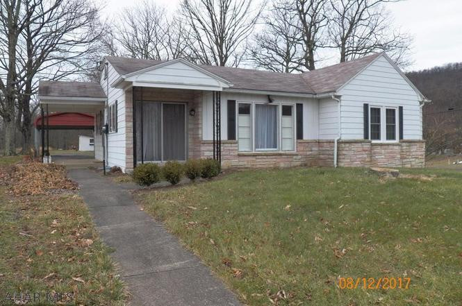 This Charming Rancher sets in USDA Area and easy access to I70. This home offers large kitchen w/new appliances including dishwasher, separate dining area, large living room with decorative FP and beautiful hardwood floors,replacement windows, 3 bedrooms with hardwood floors and 1 bath, sets on 4.13 acres with 24X12 shed.
