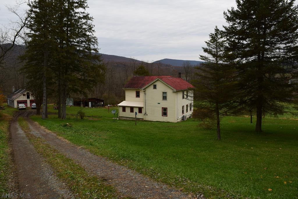 17 acre river front property great for a business or your private home. A property like this does not become available often. A spacious 3 bedroom home with a detached two garage and a separate outbuilding. The property is partially wooded with a natural spring and a stream. Call the listing agent today for a private showing.