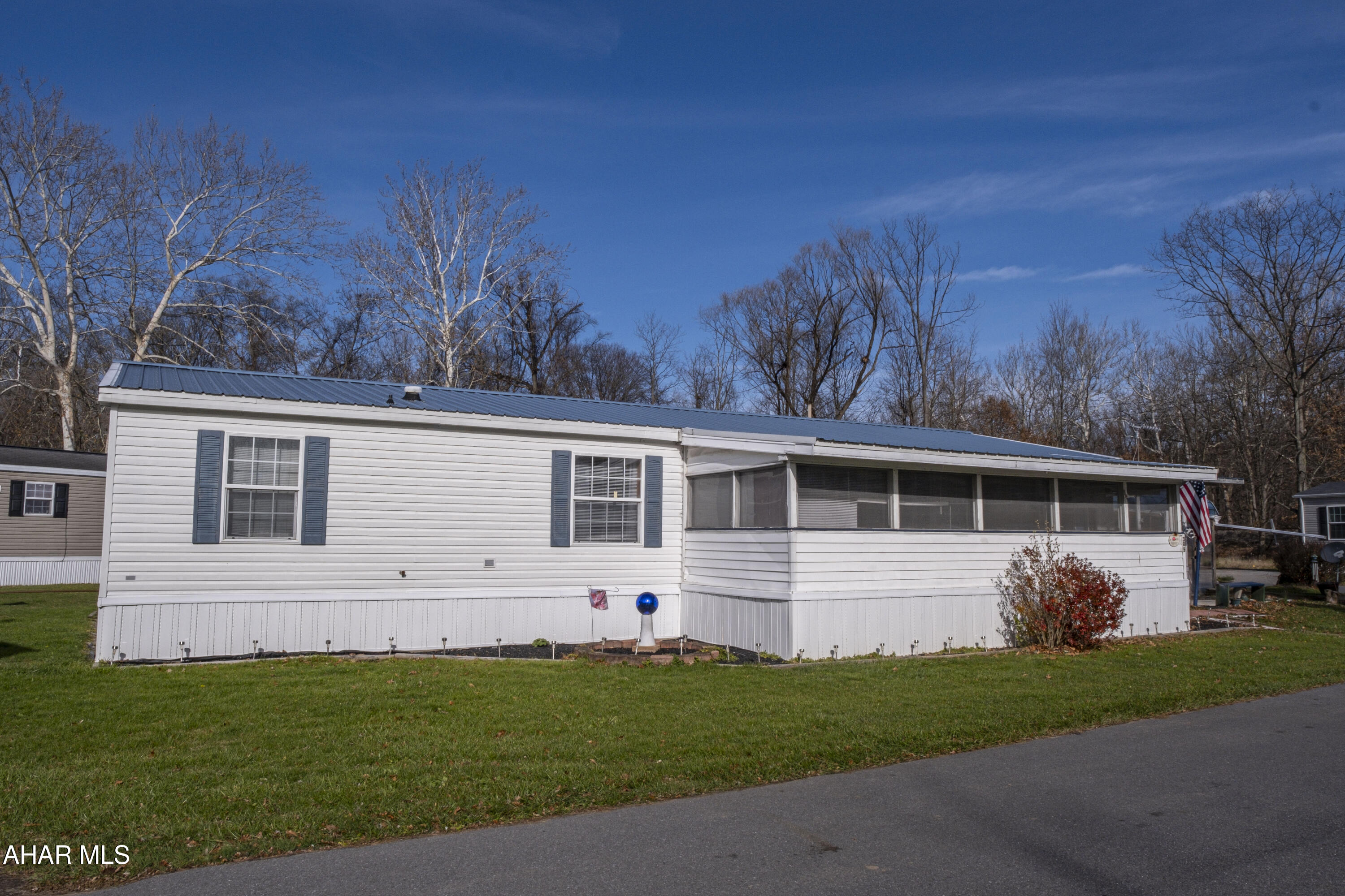Spacious 3 bedroom, 2 bathroom double-wide home with a bonus addition in Cross Keys Village, Duncansville. This move-in-ready property offers a bright, open layout, an updated kitchen, and a comfortable primary suite. Outside you'll find a covered carport and a storage shed with electricity - perfect for tools, hobbies, or extra space. Lot rent is $653 per month and includes trash removal. A great opportunity for affordable and convenient living in a well-kept manufactured home community.