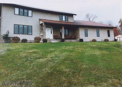 COMP ONLY.  Beautiful home in a quiet community. This home offers 3 bedrooms, 2 1/2 baths. Master bedroom with master bath and walk-in closet. The kitchen offers plenty of space, all appliances and beautiful cherry cabinets. Also offers dinette, with wet bar & fridge. Extra room off dinning room with gas fireplace and lots of light from the sky lights. Extra room off kitchen could be used as an office or other. Extra room off of laundry room provides plenty of storage. Spacious attached three car garage with propane. Garage is 36 x 30. Lots of extra space