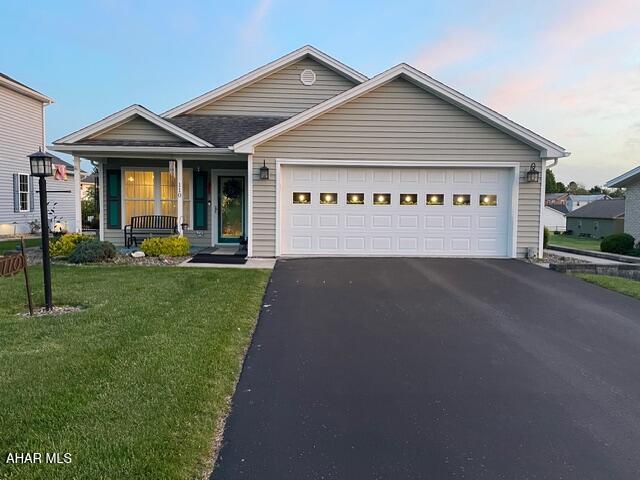NEW PRICE!  One floor maintenance-free living and a backyard oasis is waiting for a new owner. This is a 3 bedroom, 2 full bath home in a fabulous location.  Inside you will find tasteful upgrades with new flooring, lighting, bathrooms and more.    Outside is an entertainers dream with a multi-level deck looking at picturesque pond frontage - which you own a piece.  With the heated and air conditioned enclosed porch you can have your morning coffee enjoying the view of the terrific outdoor sanctuary.  The present owners will be leaving you the automatically retracting awning along with new trees and bushes that bring nature right to your door.  This home is not only beautiful inside and out it is also practical with a 2 car attached garage, a central vac and an abundance of attic storage. Schedule your time to see all this home can offer you.