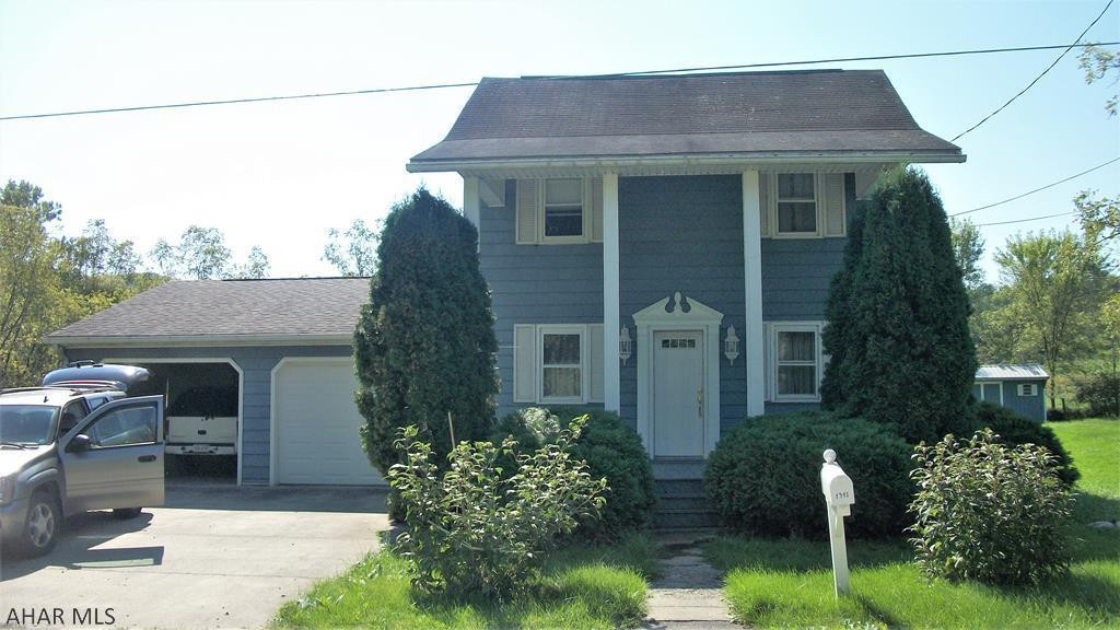 Are you a first-time home buyer, an investor or looking to downsize?  Come take a look at this charming, two bedroom home with an attached two-car garage.  With a liittle TLC, this could be your cozy home or weekend getaway. It is located close to Yellow Creek, renowned for its trout fishing.  The large, gently sloping lot is over one-half of an acre.  Included in the sale is a 10 by 20 shed and a 14 by 56 single-wide trailer built in 1985 that has been used as a storage unit for the past 17 years.  It could possibly be updated and used a rental unit.  Property is located in a flood zone.  There is another 1/2 acre parcel bordering the property that may be available if a buyer is wanting a larger lot.  That parcel will have to be negotiated separately.  No offers accepted before 5/7/22.
