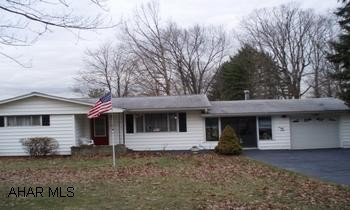 Rancher with garage, breezeway on large level lot.