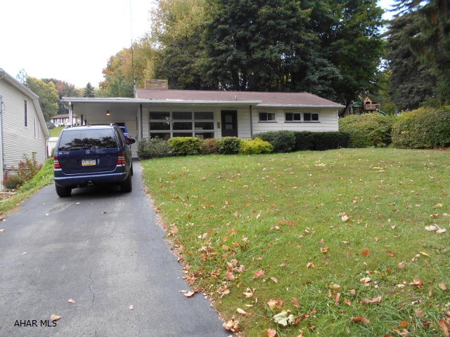 This home has huge bedrooms. Larger than it looks. Huge living room with gas fireplace,and a breakfast nook that could be first floor laundry. Hardwood floors under the carpets in the living room and dining room. This property is close to I99 and Pleasant valley blvd.