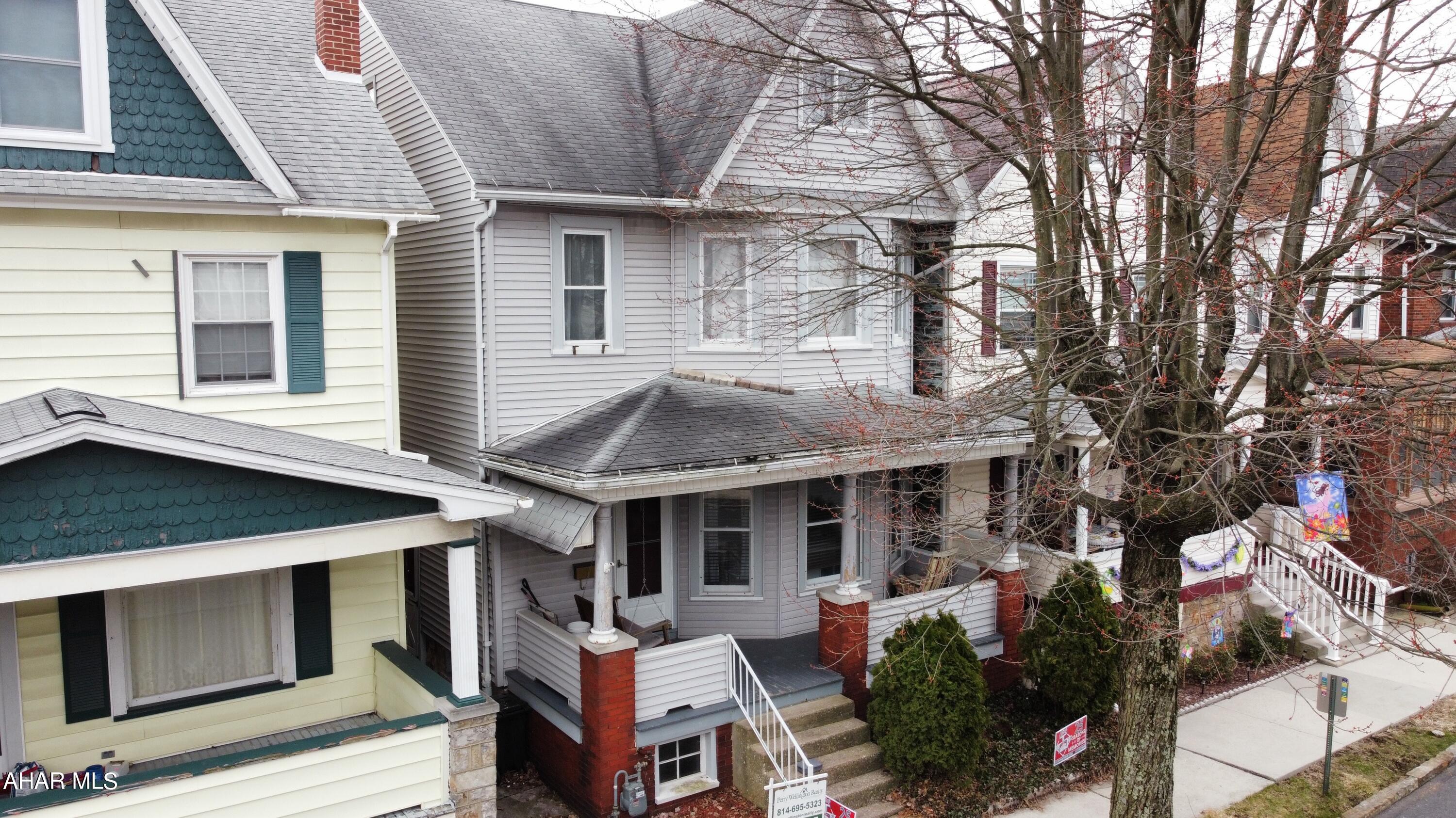 This charming 3 bedroom home, is in the heart of Altoona. It features a large front porch, original woodwork, custom made radiator covers, and new laminate flooring throughout the downstairs.  There is a large finished (unheated) attic that could potentially become a fourth bedroom. This home has retained a lot of its original character but also has many updates including a newer electrical system in the upstairs, and an updated bathroom. A commercial grade water heater that was installed in 2020. The Stove and Refrigerator were purchased within the last 2 years. There is also a 2-car garage with a remote garage door opener.