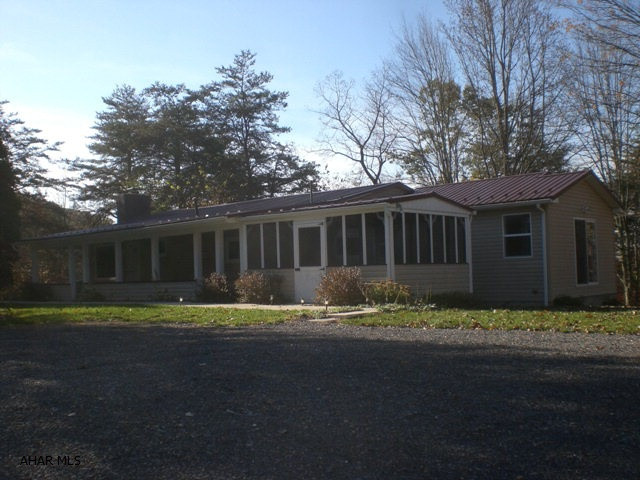 Well-maintained stick built ranch home resting on 4.36 acres. Updated metal roof, vinyl siding, replacement windows, large screen porch, front covered porch and large rear deck. LR w/wood FP, Kit w/eat-in area, 3-bedrooms and full bath. Full bsmt w/ half bath, oil, FA heat, central air, public water & private septic. Close to state lands and Lake Koon & Gordon.