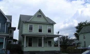 2 STORY VINYL SIDED WITH DETACHED 2 CAR GARAGE. NICE TWO STORY WITH VINYL SIDING, NEWER WINDOWS AND ROOF AND A 2 CAR GARAGE, 2 BATHS.  BRAND NEW HOT WATER TANK.  PROPERTY WAS DUPLEXED AT ONE TIME.  SAUNA IN BASEMENT.  BASEMENT EXIT TO GARAGE.  CALL DAN PETERS OR NANCY VEIGN.