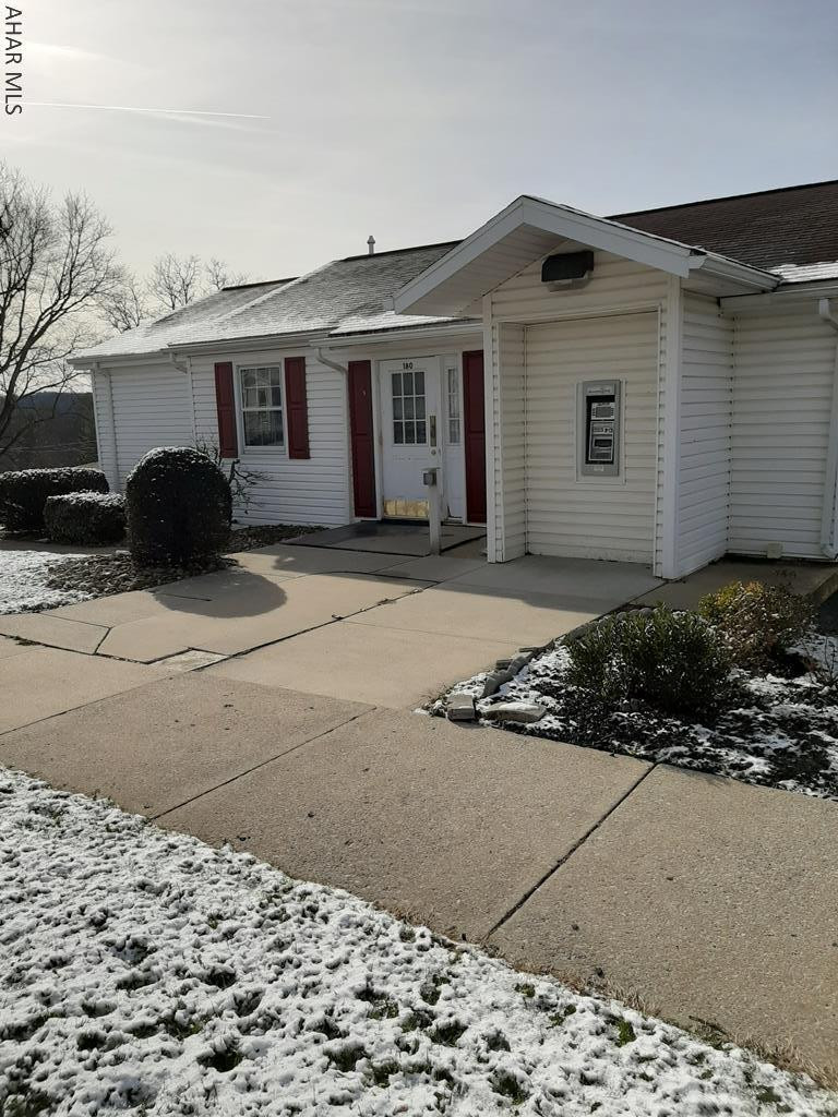 Come check out the perfect office space near St. Francis College. There is a main office area with 2 additional private offices. Vault is still existing in this remodeled bank with ATM. Storage closets in main area plus down the hall is a kitchenette/breakroom with access to outside or to the basement. The basement offers more storage with separate entrance. This could easily be turned into a rental space for additional income. Plenty of paved off street parking, security system, handicap accessible, internet/Wi-Fi, nice clean space for your new or existing business. Highly sought location! Call for showing today!!
