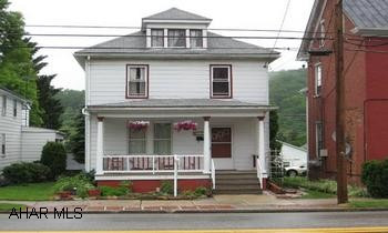 Great value & convenience!  This home features 4 BR, 1 1/2 BA, central air, updated kitchen cabinets, 1st flr laundry, lrg covered front porch &  is walking distance to downtown.  Plus, a lovely private fenced back yard leading to a two-car carport with rear alley access.  R-3 / Historic District.  Contact Chris Bollman at 814-215-0017.