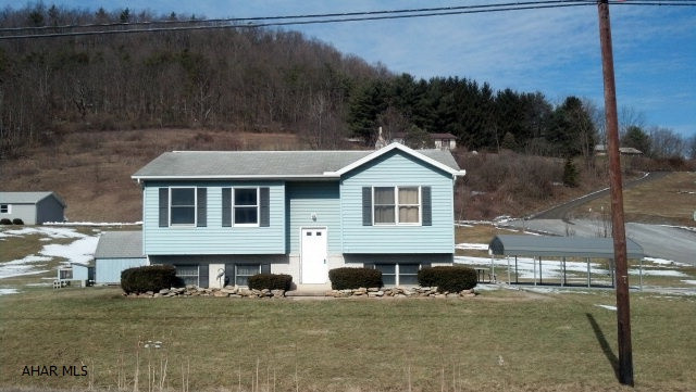 Affordable and adorable 3 bedroom, 1 bath bi-level home situated on 0.50> acre in the Bald Eagle Area School District.  Relax on the inviting back> deck overlooking rolling mountains in a country setting that is close to Bellefonte, State College and PSU, with easy access to I-80 and I-99.  For added convenience, storage shed, paved driveway, and carport awaits you.Inside,get cozy in the freshly painted rooms and propane heater. Excellent location and neighborhood for families; walking distance from Wingate Elementary and Bald Eagle Area Middle/High School.  As an added bonus,grab your fishing poles and take a short walk to Wallace Run, one of the best fishing around.