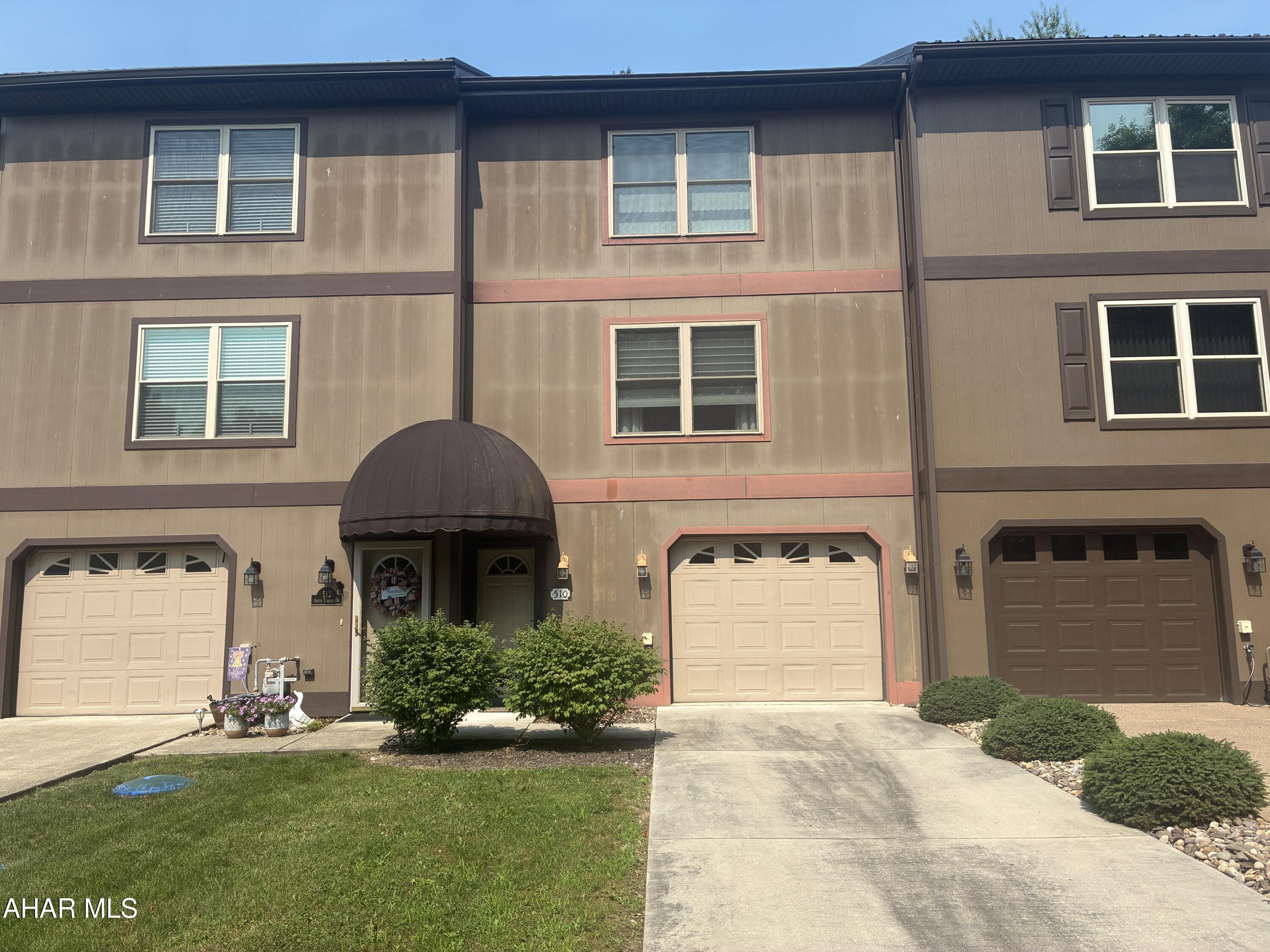 Nice 2 Bedroom 3 Bath Townhouse in Penn Terrace ,Very Spacious rooms and with Plenty of Closet Space Throughout Cherry Kitchen Cabinetry  ,large rear yard with pull out awning on the deck for those hot days.Newer Hot Water Tank,1 car garage with convenient built in storage racks ,Great location in Altoona with close Proximity to shopping and Restaurants.