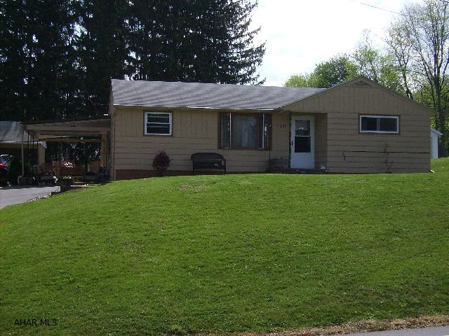 Enjoy The View From The Covered Patio On This Great 3 BR Ranch Priced To Sell!!  Great Quiet Location - Right Outside Borough Limits.  Electric Totally Redone - New Service, New Panel 200 Amp, All New Receptacles & GFI'S, New Carpet, New Windows - 2 Zone Hot Water Boiler - Loads Of Closets & Storage Space - Home Has Been Freshly Painted - Attached 1-Car Garage + 1-Car Carport - Woodburning Fireplace W/Insert.  New Counter Tops & Stainless Steel Appliances, Also Included An Upright Freezer.