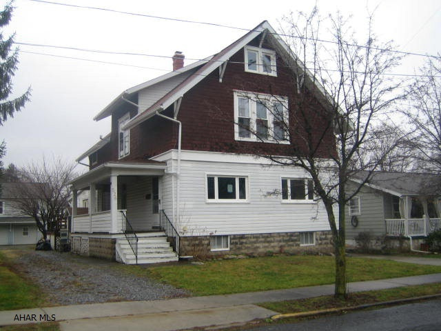 Bellwood Borough home in need of some work, but a rare opportunity for the right buyer to be in one of Blair County's nicest areas. Lots of room inside with 4 nice sized bedrooms, living room with fireplace, family room with fireplace, den, sunroom, formal dining room plus two rooms in attic. AS-IS sale.
