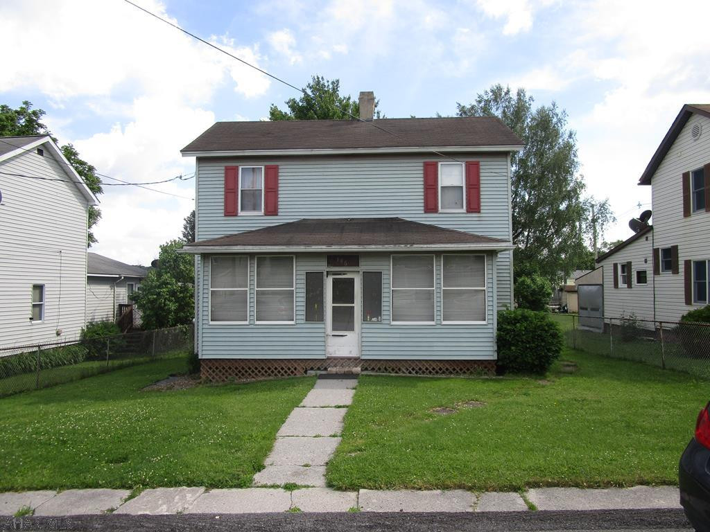 Vinyl sided 3 bedroom two story home in Revloc. Great starter home! Thermopane windows, oil FA heat, 100 amp breakers. Nice rear yard with storage shed. Enclosed front porch and rear deck.