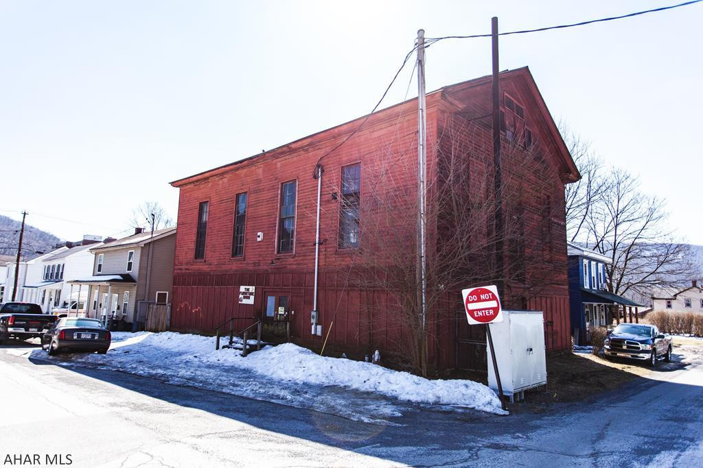 Very large barn with lots of potential. Large, open second floor with offices on the third floor.