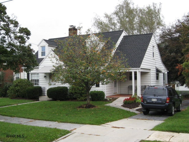 Immaculate Cape Cod with upgrades and in a convenient in-town location. Beautiful hardwood floors on first floor, large living room with fireplace, big eat-in kitchen with new granite countertops. Upstairs includes new carpeting, a large master suite with Jacuzzi and a bonus room with walk-in closet. Covered side porch, large deck overlooks back yard with white picket fence and gazebo. Integral 1-car garage and detached 3-bay garage with lots of possibilities.