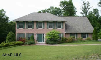 Prestigious 2-story Brick/vinyl home located in Ridgewood Heights, decorator pluses, professional landscaping; partially finished basement has carpet, ceramic tile,walls, plumbed for half bath. Deck overlooking yard and wooded area; brick paved patio, central vacum, ceiling fans, chandeliers, oak trim, wired for in house sound system.