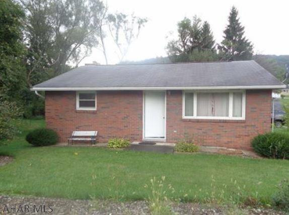 All brick home and brick one car garage.  Needs TLC but nice location on corner lot.