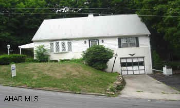 CAPE COD STYLE HOUSE WITH 4 BR & 1.5 BATH. TERRIFFIC COVERED DECK. 4 BEDROOMS- WHO NEEDS THEM? BESIDE THE BEDROOMS THERE'S 1.5 BATHS, COVERED DECK, ONE CAR GARAGE AND A FINISHED BASEMENT. $89,000. SEE MIKE McCAULLEY.