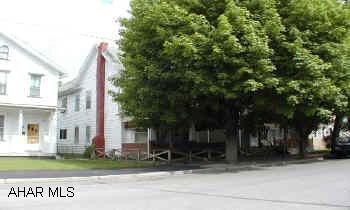 Nice 3 bedroom home with finished 3rd floor.  Hardwood floors, newer gas hot water furnace.  2 car block garage.