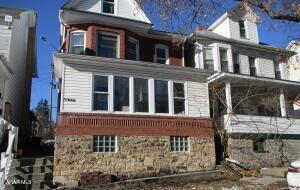 Fairview brick features 4 bedrooms,  main level laundry area.  Baseboard heating system and flooring are all recently installed.   Kitchen and bath recently updated; Interior photos reflect renovations.  Off street parking from alley at rear.  PROPERTY HAS BEEN RENTED AS OF 3/1/26 AT $1282/MO PLUS GAS, ELECTRIC AND WATER/SEWER OVER $150 PER MONTH.