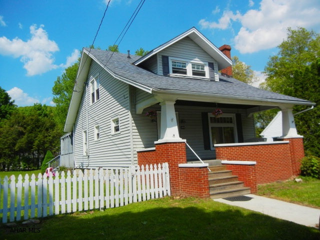 OPEN HOUSE, SUNDAY, MARCH 23  (11:30 ---1:00)  Price reduced!  This great home offers 3BR, 1.5BA (both bathrooms are updated) The kitchen was recently updated and offers ample oak cabinets and a breakfast bar and eating area.  Also, has a separate Dining room as well.  Hardwood floors in different areas of the home.  Set the mood and listen  to the crackling wood from the fireplace in the living room.  This home is situated on a large level lot and is already fenced in for the kids to play or the dogs to roam about.  Entertain on the large deck off the rear of the home.
