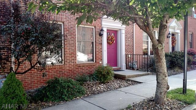 The townhouses on this street are so charming!  You'll think you're in San Francisco.  This unit is very nice, well maintained, and move-in ready.  Features include large bedrooms, 1.5 bathrooms,  a finished basement, a covered deck, a covered patio, central air, 2 laundry chutes, and more.  All appliances stay.